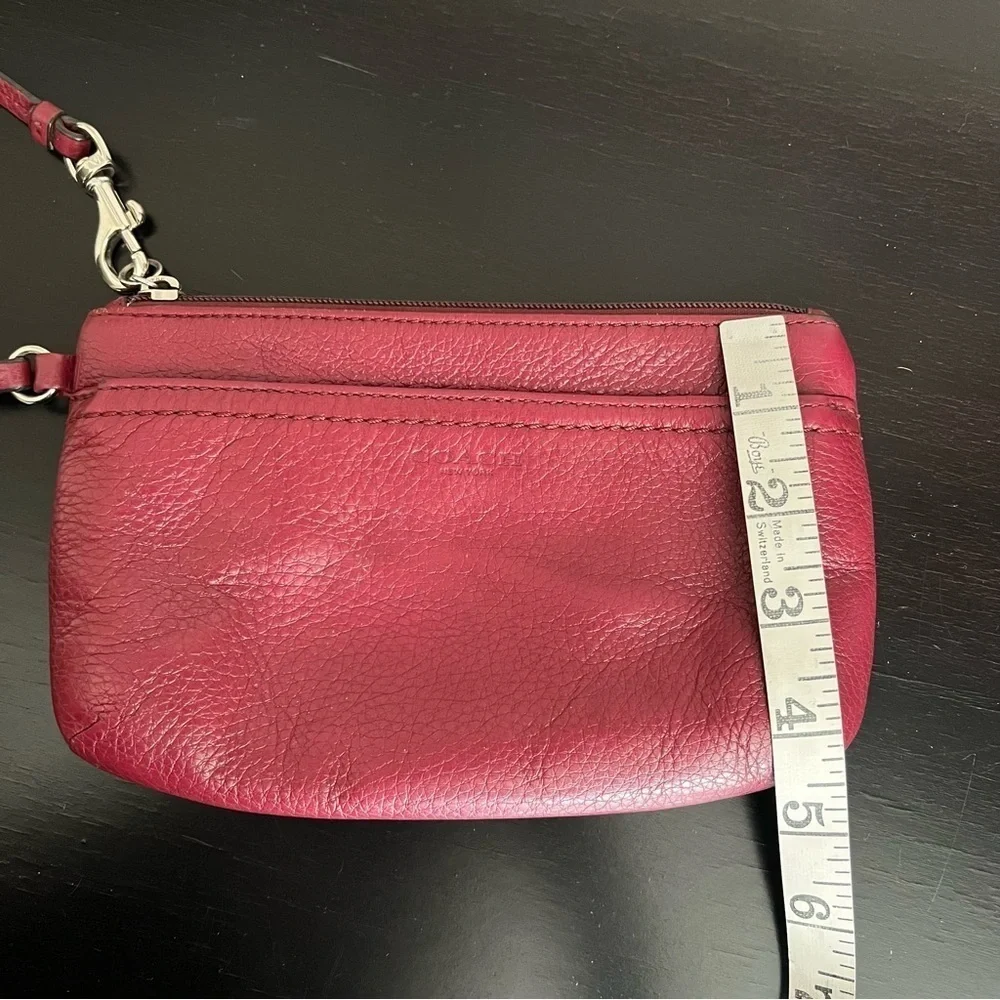 Coach Leather wristlet, dark red 8”x4.5”